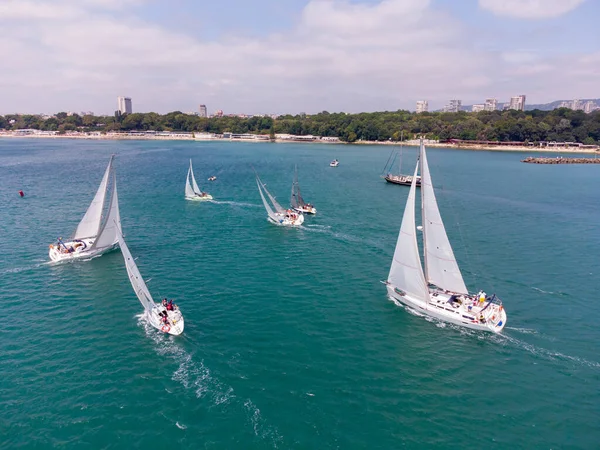 Aerial top view of sailing yachts regatta race on sea near Varna in Bulgaria, Black sea