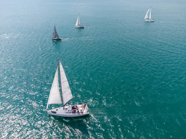Aerial top view of sailing yachts regatta race on sea near Varna in Bulgaria, Black sea