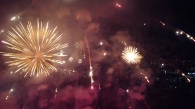 fireworks over the night city aerial view