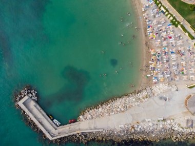 Aerial top View Of People Crowd Relaxing On Beach
