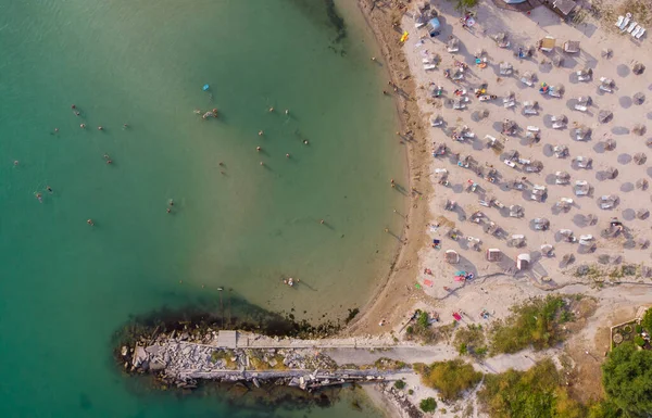 Aerial top View Of People Crowd Relaxing On Beach