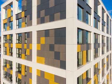 Facade of modern office or residential building drone video aerial view