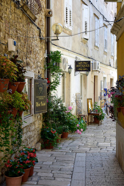 Narrow street in the old town of Porec, Istria, Croatia