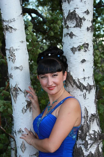 Beautiful girl near birches — Stock Photo, Image