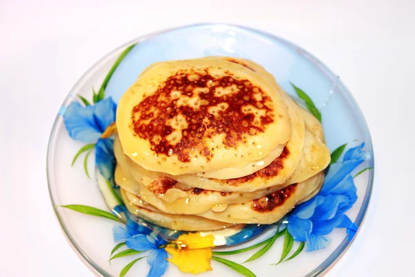 Panqueques pequeños con miel —  Fotos de Stock