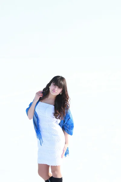 A young girl in a white dress — Stock Photo, Image