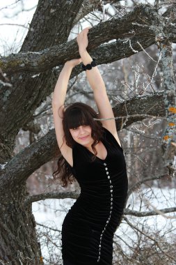 The girl near a tree