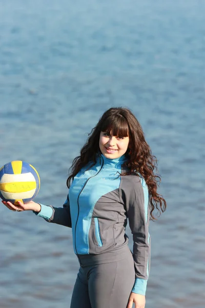 Beautiful young girl with a volleyball ball — Stock Photo, Image