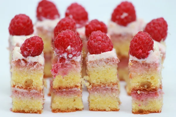 Slices of cake with raspberries — Stock Photo, Image