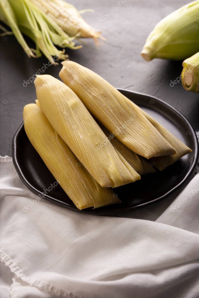 Tamales de Elote, también llamado Uchepos. Plato típico mexicano. Se