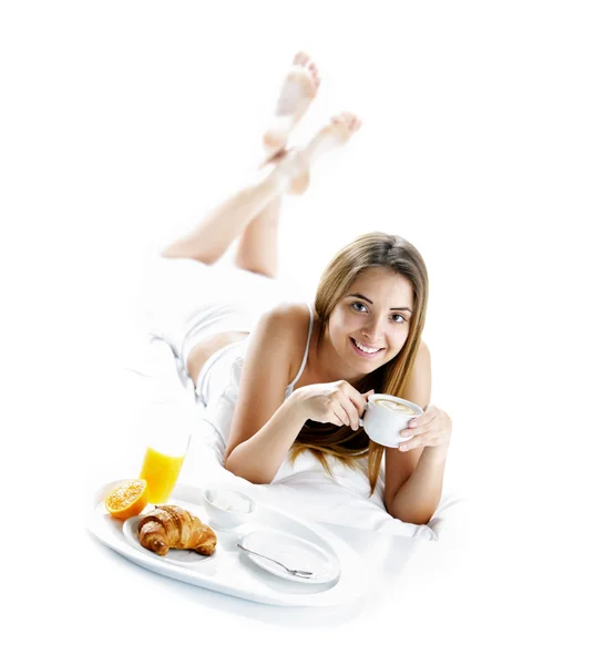 Smiling woman having breakfast — Stock Photo, Image