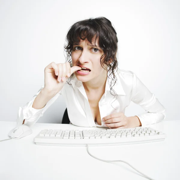 Nail biting businesswoman frontal portrait — Stock Photo, Image