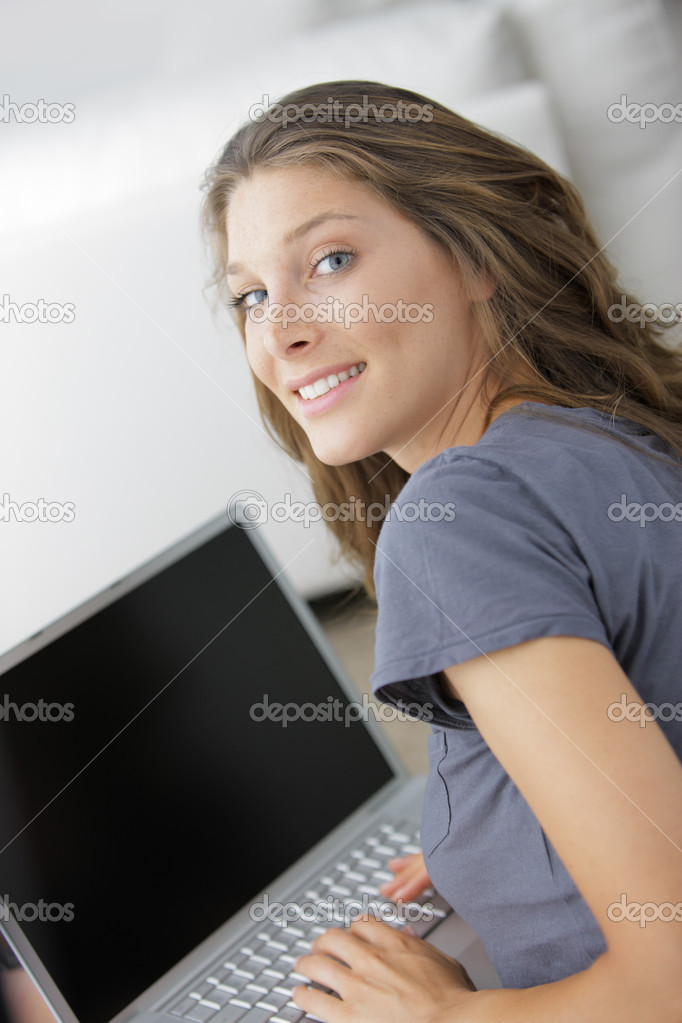 Attractive woman working on laptop