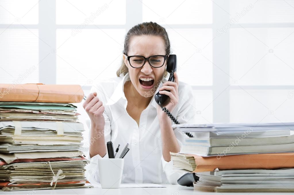 Angry Business woman Shouting At Phone