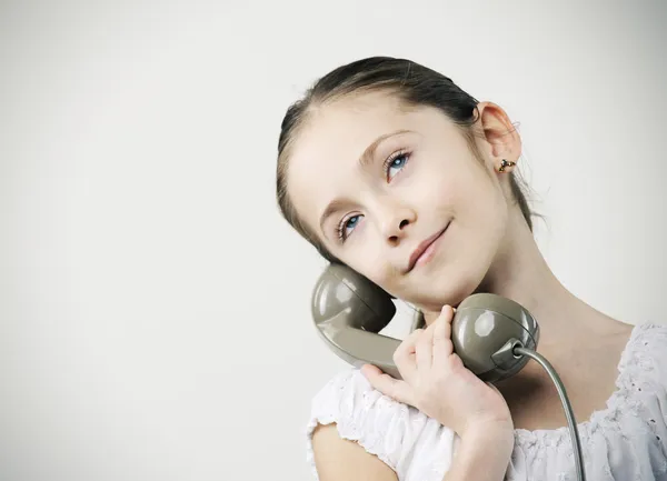 Little girl with vintage phone — Stock Photo, Image