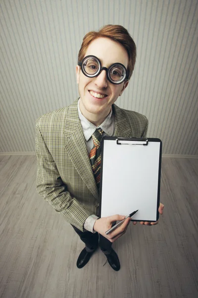 Business man nerd holds a blank sign — Stock Photo, Image