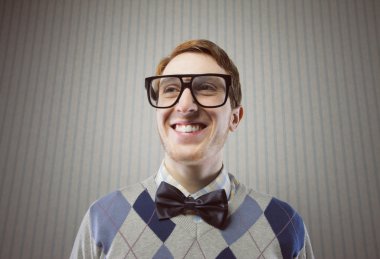 Nerd student making a funny smiling face clipart