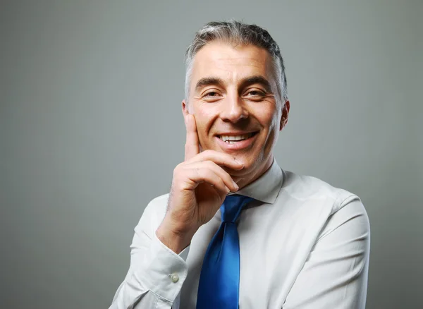 Hombre de negocios sonriendo — Foto de Stock