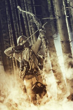 gaz maskesi giymiş bir erkek bow hunter