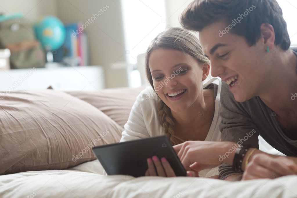Happy Couple with digital tablet