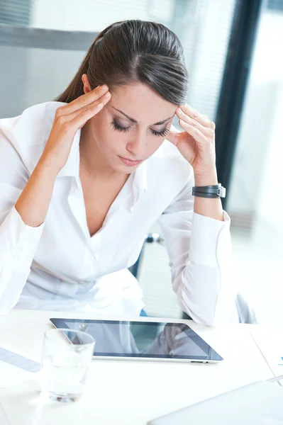 Exhausted businesswoman Royalty Free Stock Images