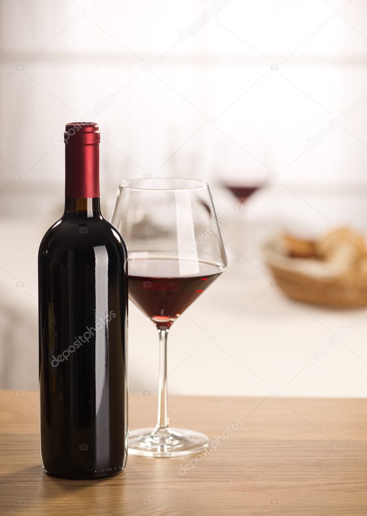 Wine glass and bottle still life