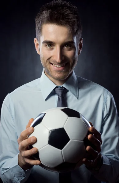 Uomo d'affari con pallone da calcio — Foto Stock