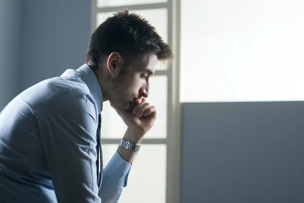 Tired pensive businessman — Stock Photo, Image