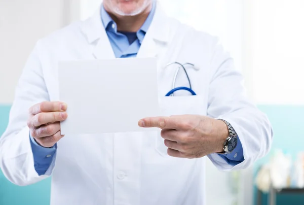 Doctor with sign — Stock Photo, Image