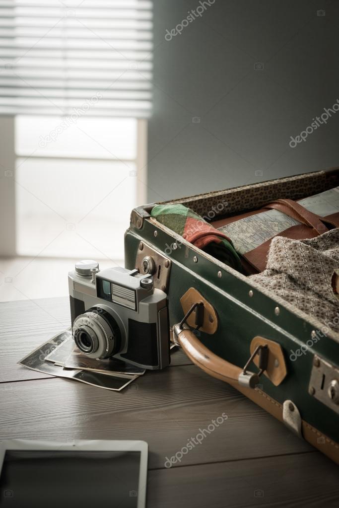 Vintage travel equipment on table