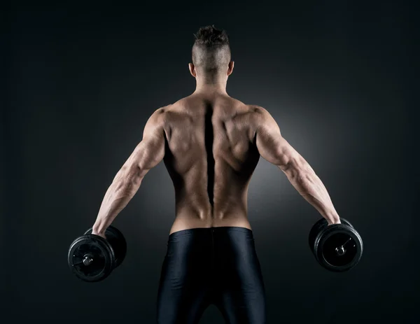 Muskulös man tyngdlyftning — Stockfoto
