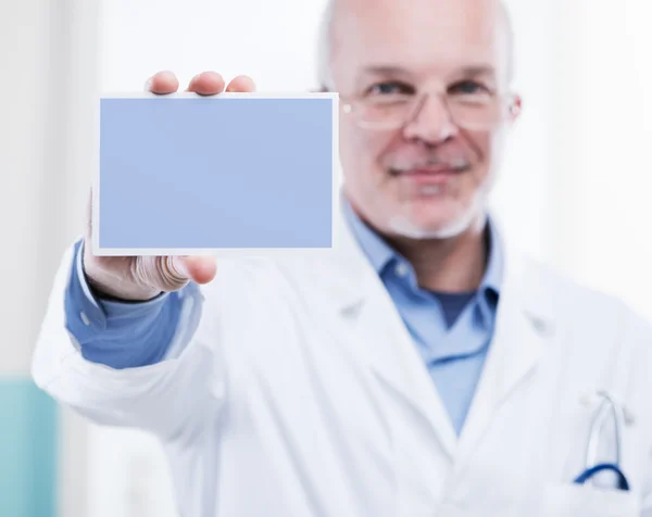 Doctor with sign — Stock Photo, Image