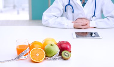 Healthcare professional promoting healthy eating clipart