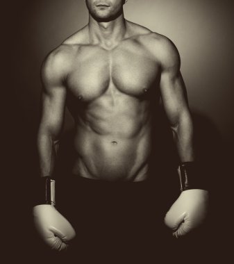 Muscular man boxing clipart