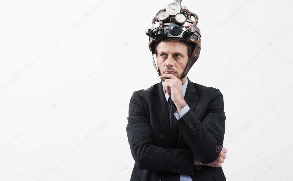 Creative businessman with steampunk helmet
