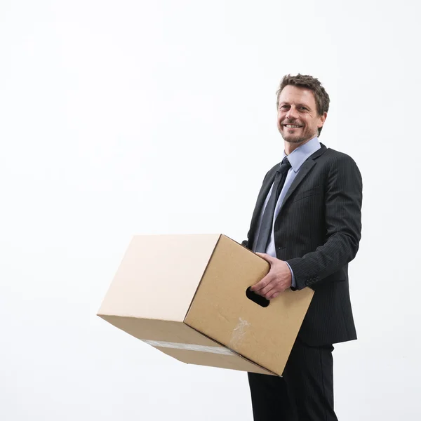 Affärsman flyttar till ett nytt kontor — Stockfoto