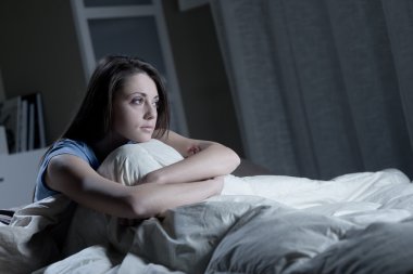Woman suffering from insomnia clipart