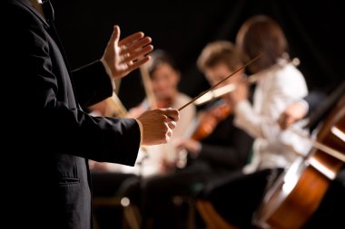 Orchestra conductor on stage clipart