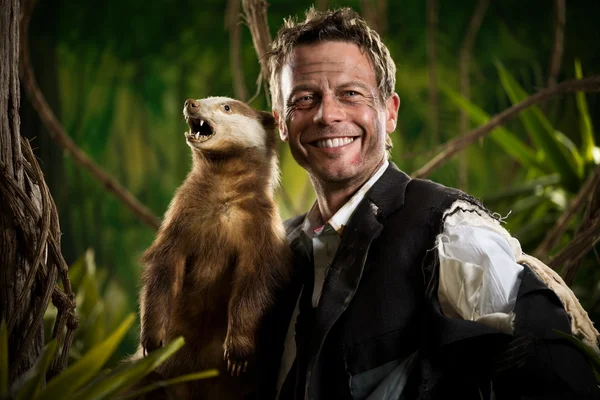 Zakenman poseren met badger — Stockfoto