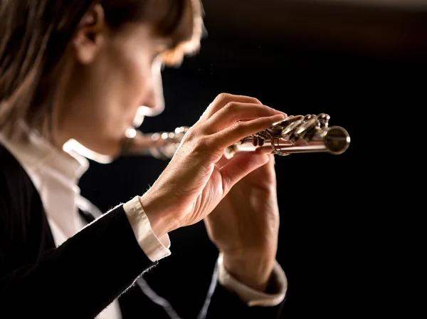 Female flutist performing — Stock Photo, Image