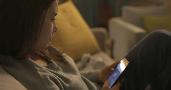 Young Teenager Sitting Couch Home Chatting Her Smartphone — Fotografia de Stock