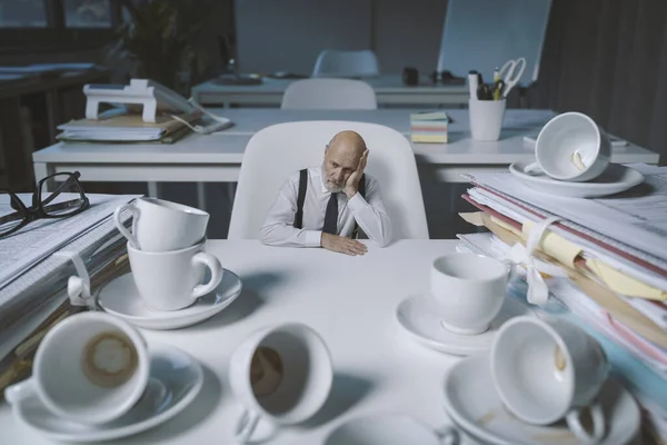 Stressed Businessman Sitting Desk Working Overtime Office Had Too Many — Zdjęcie stockowe