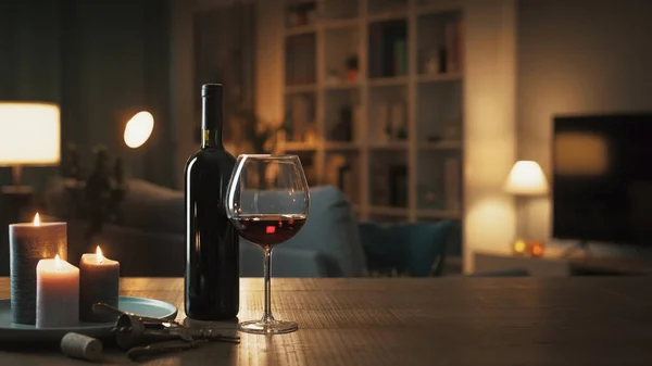 Red Wine Tasting Home Wine Bottle Wineglass Corkscrew Candles Table — 图库照片