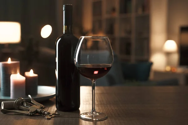 Red Wine Tasting Home Wine Bottle Wineglass Corkscrew Candles Table — 图库照片