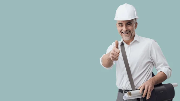 Cheerful Construction Engineer Giving Thumbs Carrying Paper Rolls Blank Copy — Foto Stock
