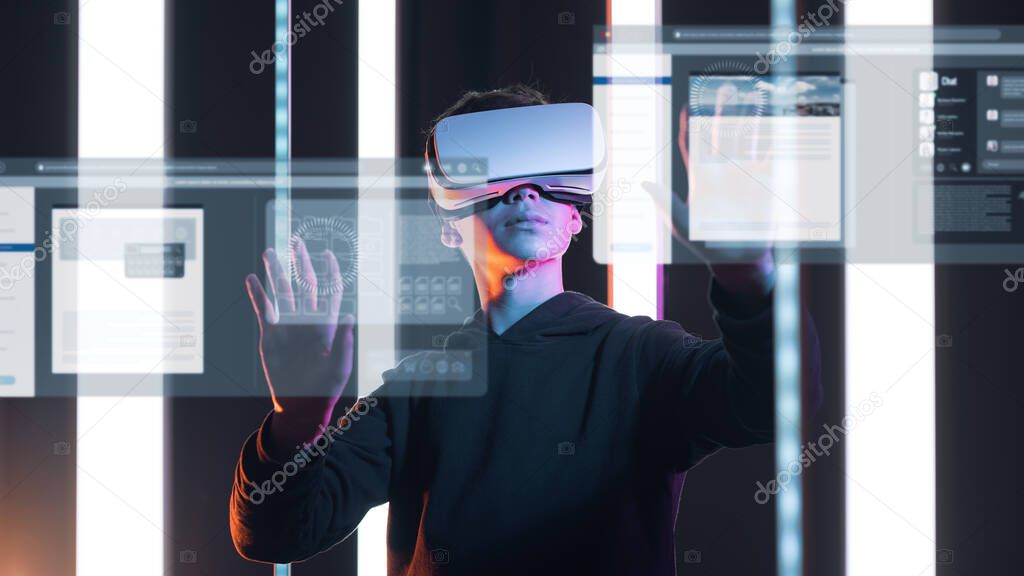 User wearing a VR headset, he is interacting with virtual screens and user interfaces, virtual desktop concept