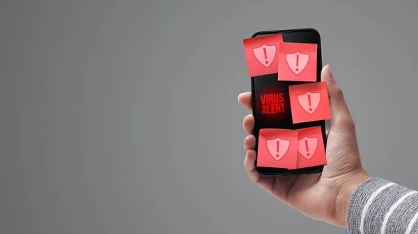 Hand Holding Smartphone Showing Antivirus Warnings Device Infected Viruses Malware — Stockfoto