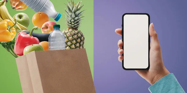Customer Holding Smartphone Blank Screen Grocery Bag Full Items — Stockfoto