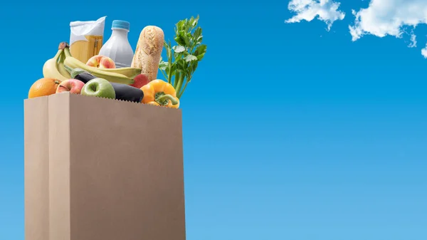 Paper Bag Full Groceries Blue Sky Grocery Shopping Concept — Foto de Stock