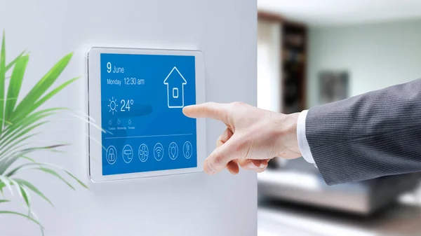 Man Checking Smart Home Touch Screen Control Panel Home Automation — ストック写真